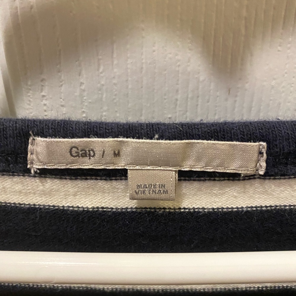 Ladies size medium, good condition, navy and white striped sweater